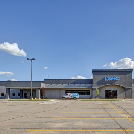 Wide view of the parking lot and building exterior