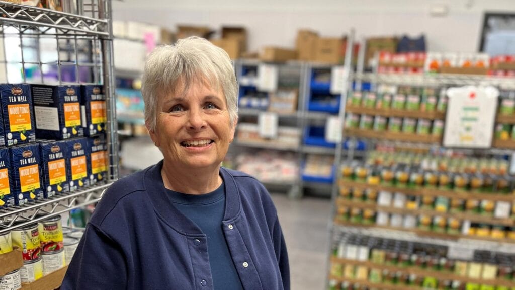 Volunteer Helen Bell at the DMARC-ket food pantry